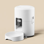 White electronic device with digital display on a white background