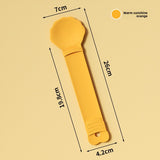 Yellow spoon with measurements on a beige background