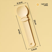 Wooden spoon with measurements on a beige background