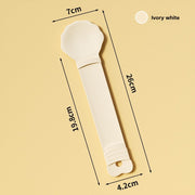 Ivory white kitchen tool with measurements on a beige background